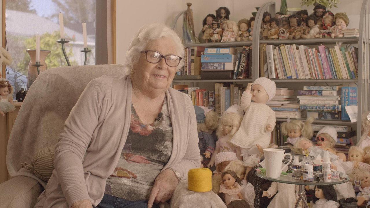 Edith Gibson has 3000 Dolls backdrop