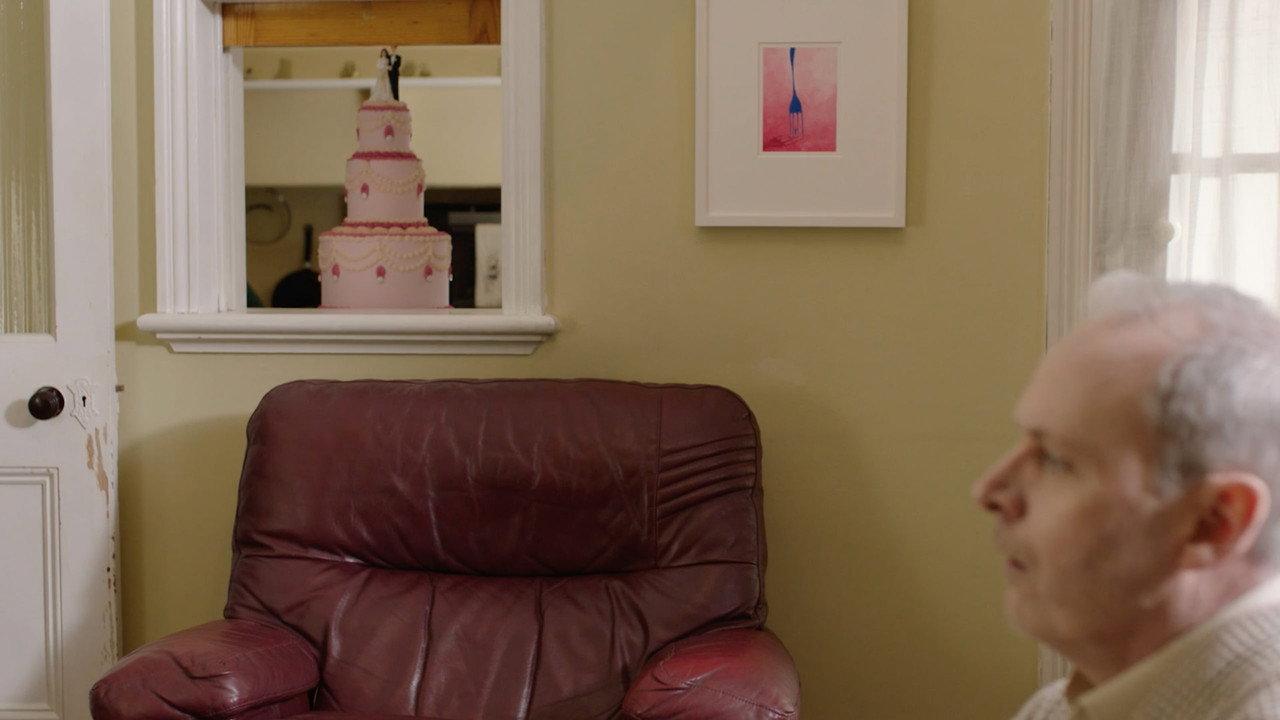 Ruby and Tom Take a Cake to a Wedding backdrop