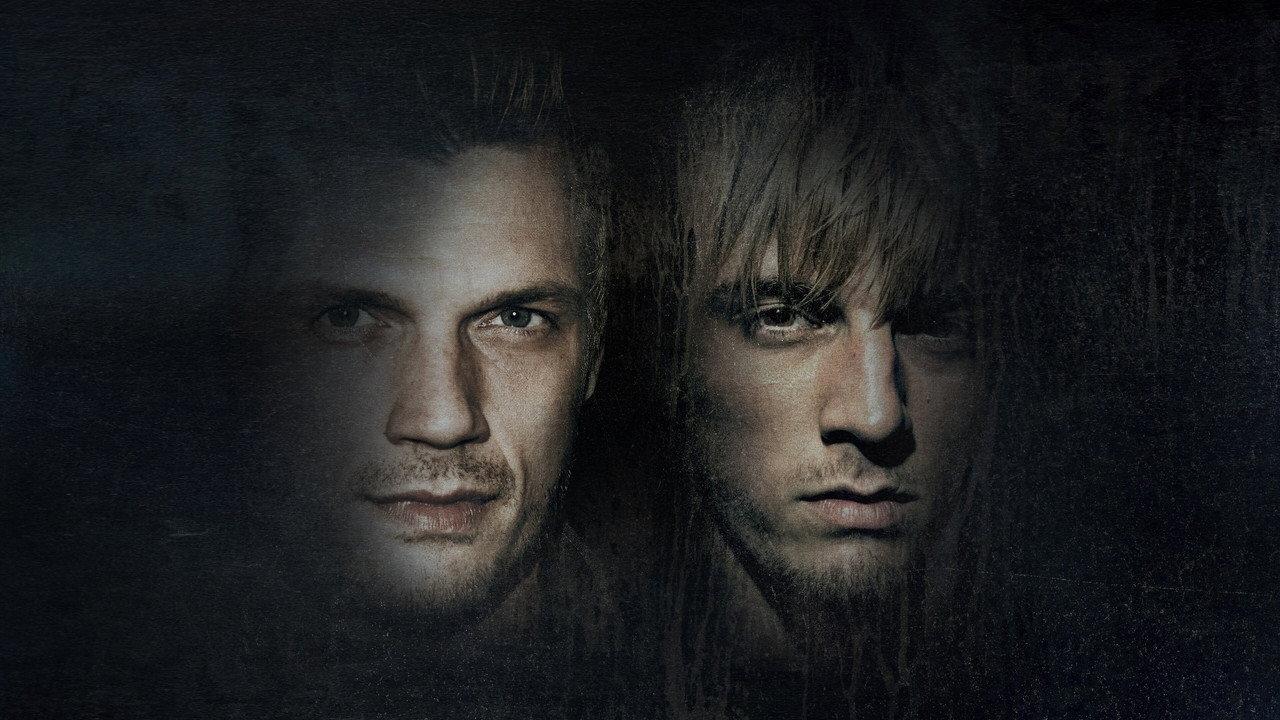 Fallen Idols: Nick and Aaron Carter backdrop
