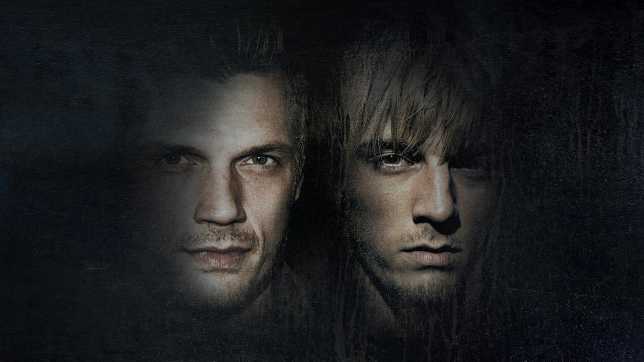 Fallen Idols: Nick and Aaron Carter backdrop