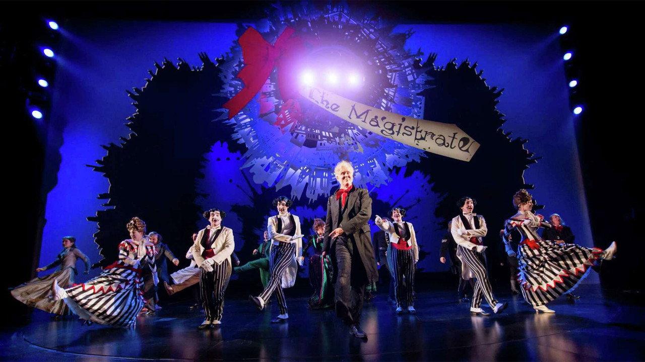 National Theatre Live: The Magistrate backdrop