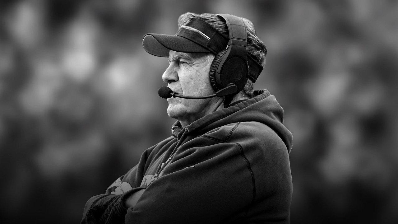 Coach with Bill Belichick backdrop