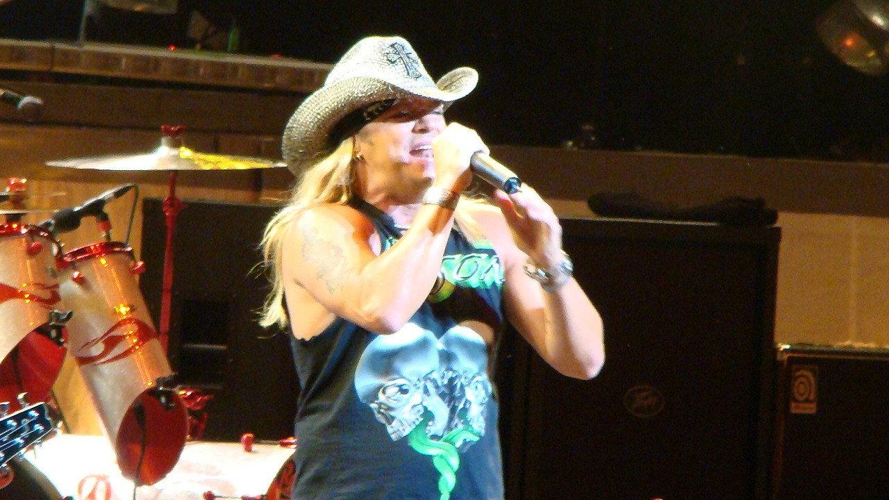 Poison: Live, Raw & Uncut backdrop