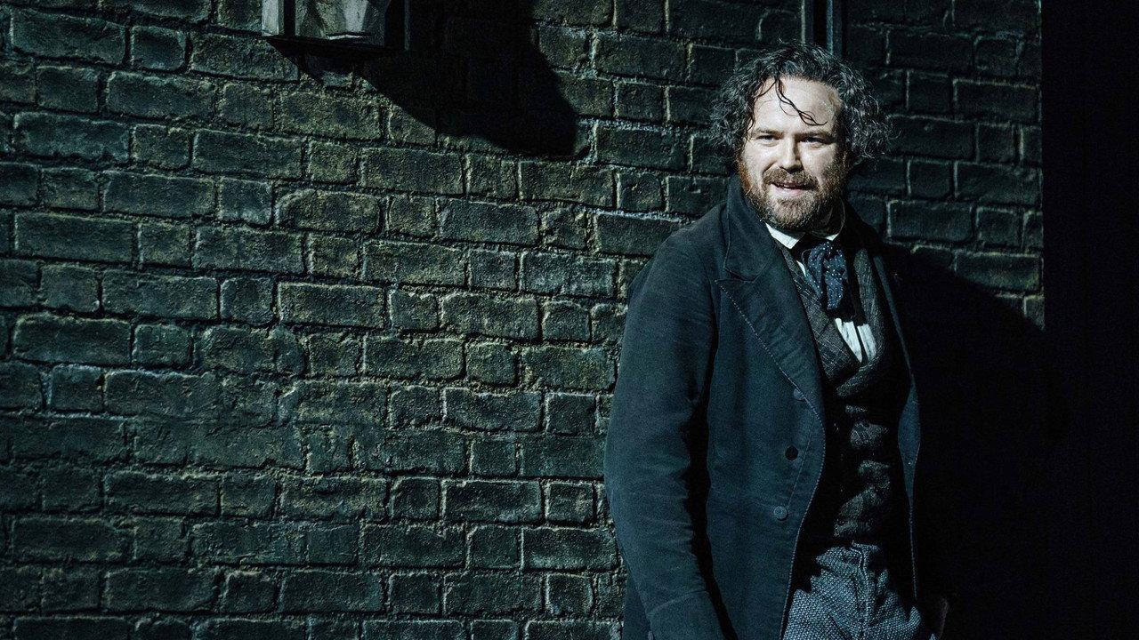 National Theatre Live: Young Marx backdrop
