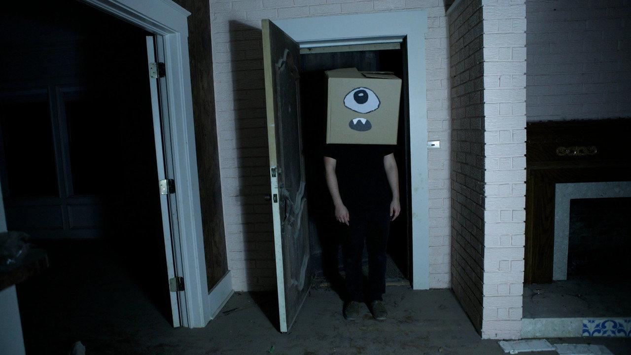 A Ghost and the Boy with a Box on His Head backdrop