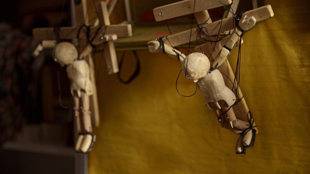 Pulling The Strings backdrop