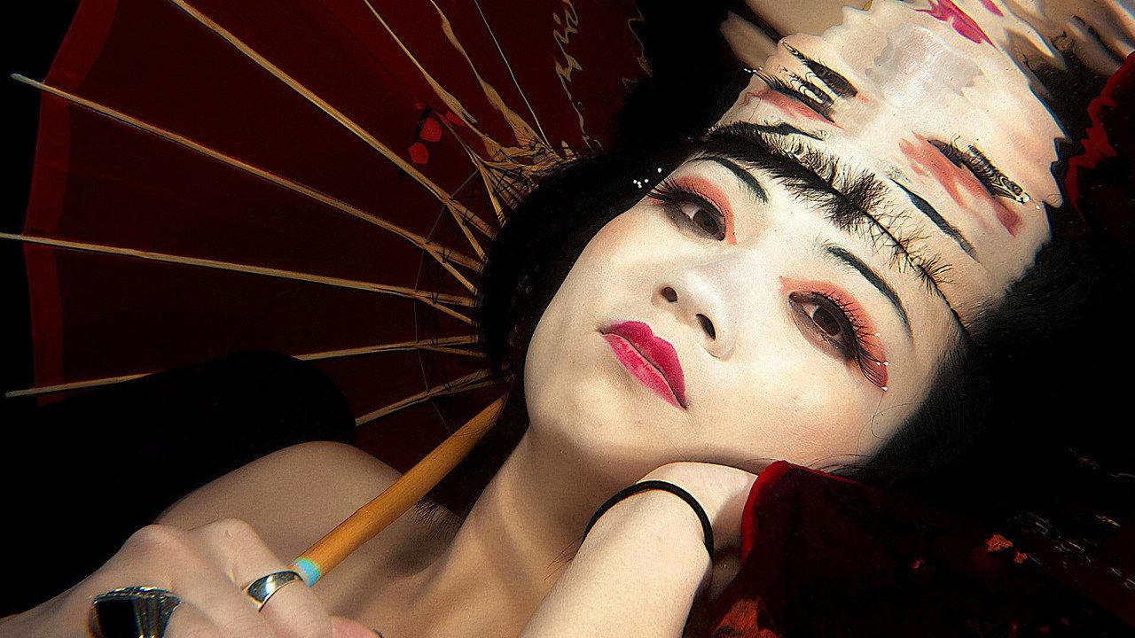 M. Butterfly backdrop