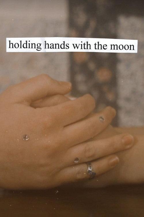 holding hands with the moon backdrop